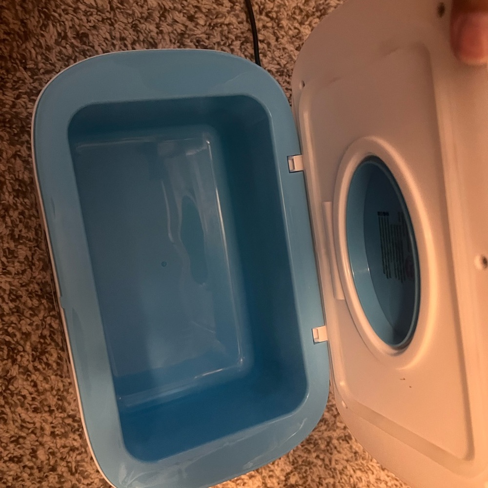 Blue wipe warmer